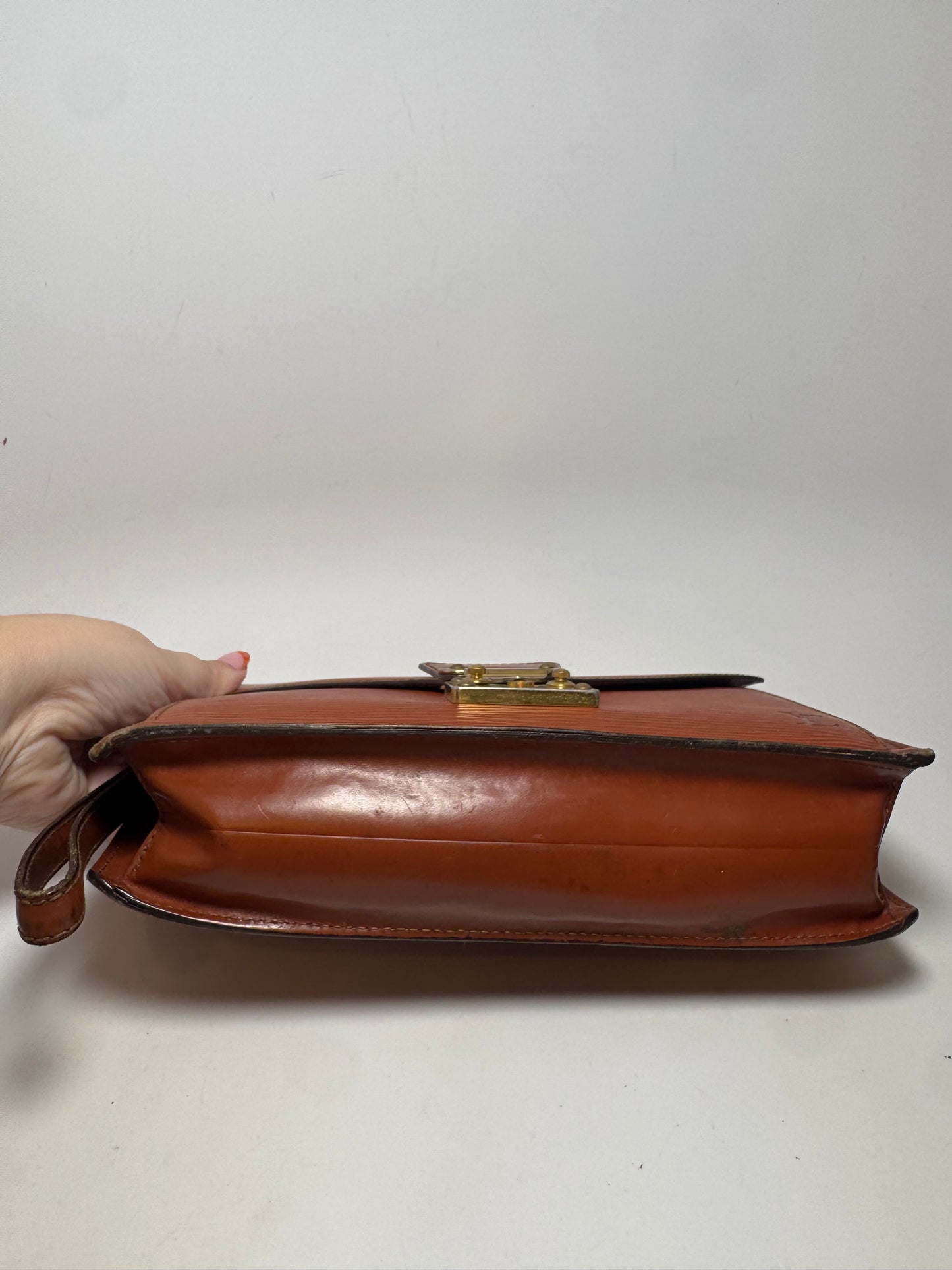 Louis Vuitton Epi Leather Serie Draggone Clutch - Fair condition