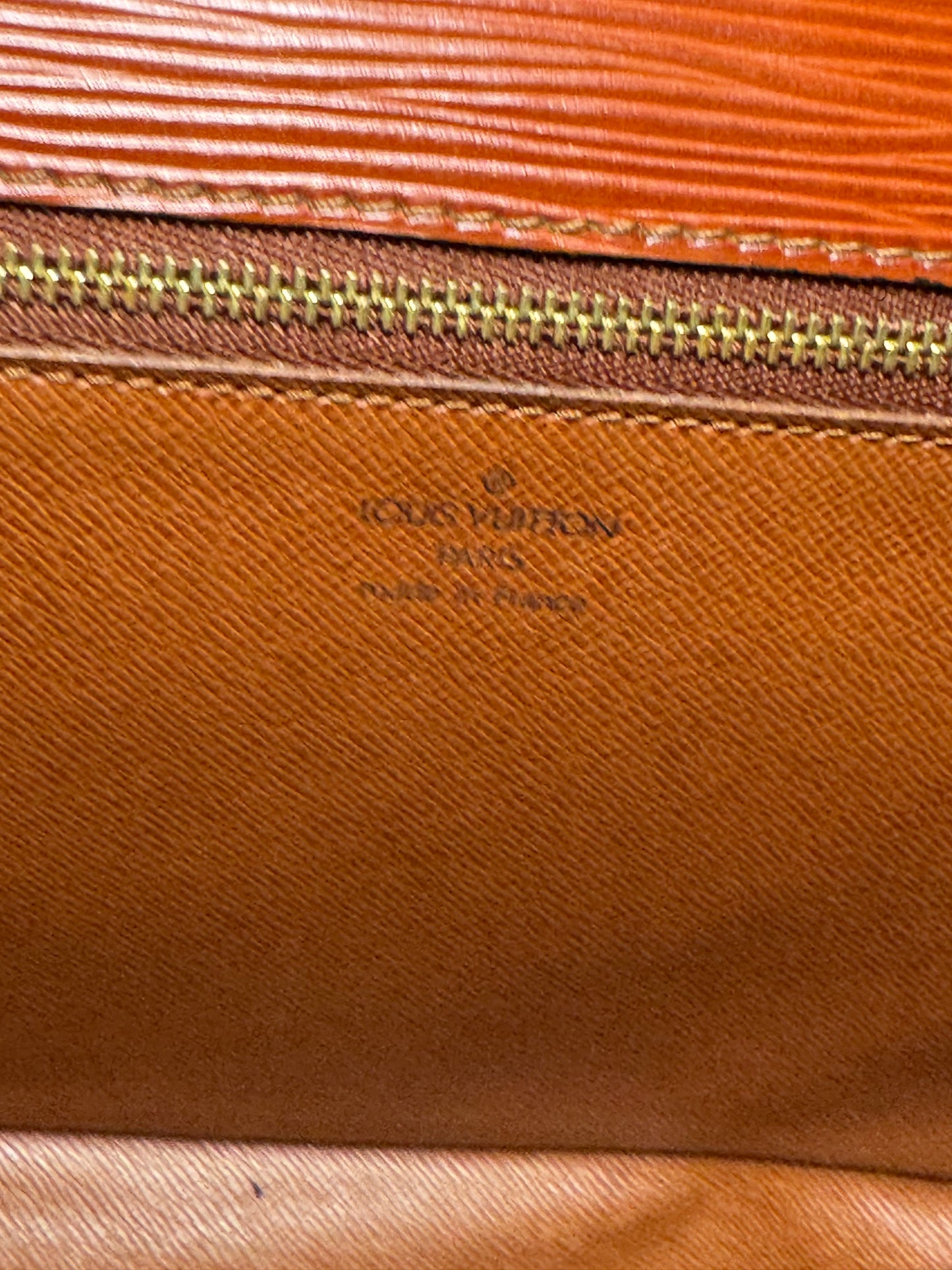 Louis Vuitton Epi Leather Serie Draggone Clutch - Fair condition