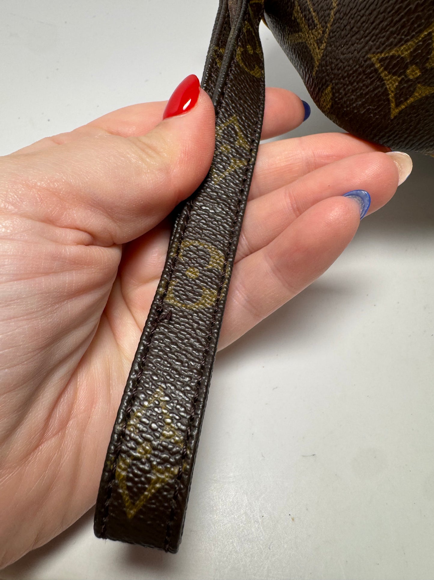 Louis Vuitton Marly Draggone Clutch/Wristlet in Monogram