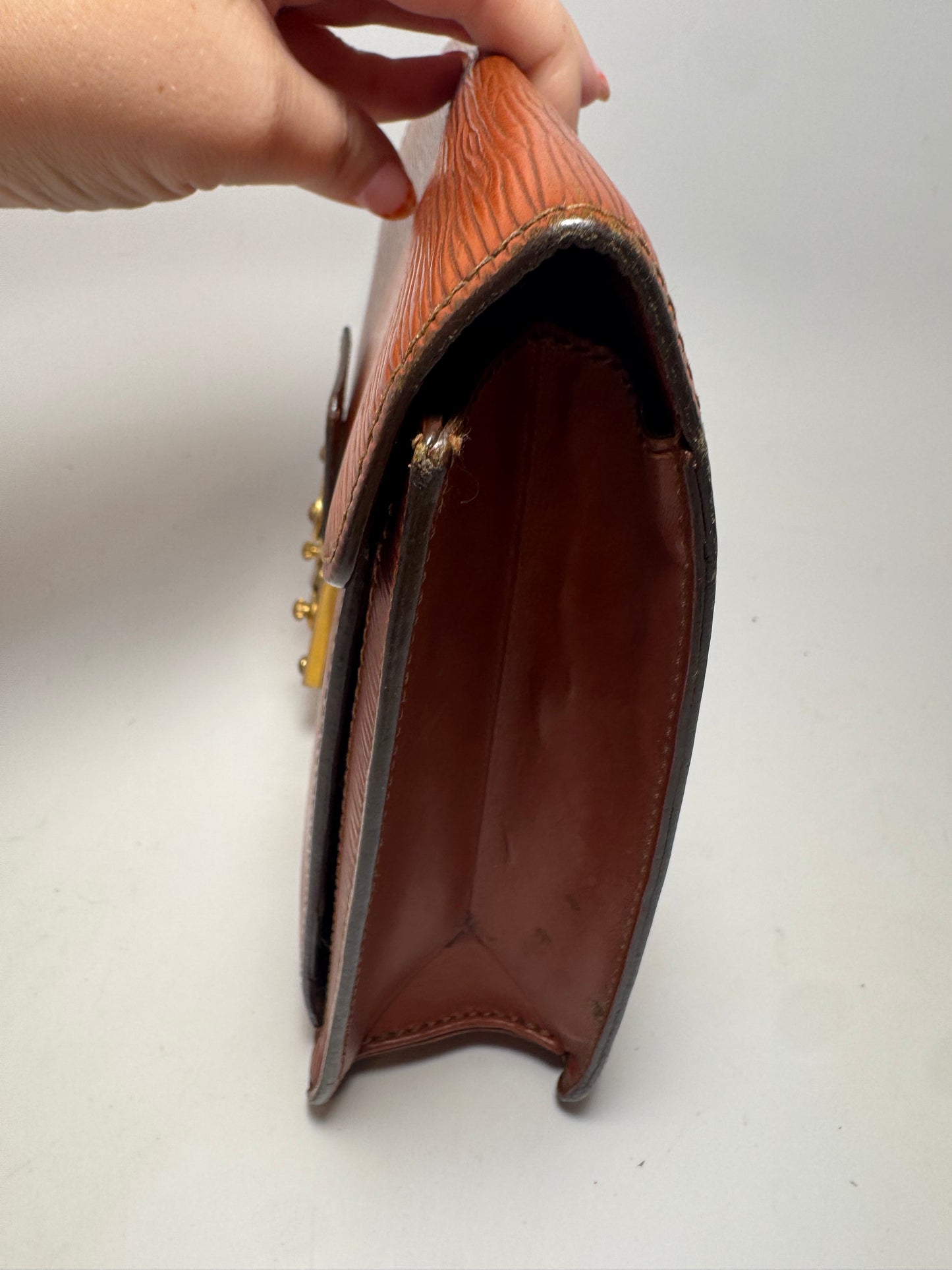 Louis Vuitton Epi Leather Serie Draggone Clutch - Fair condition