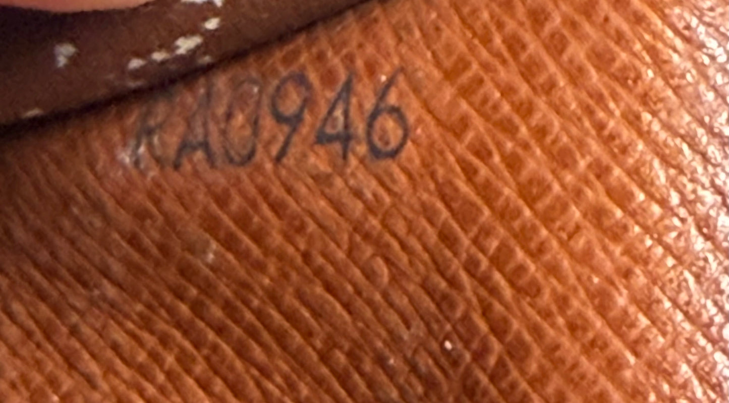 Louis Vuitton Porte Monnaie Tressor Monogram Wallet