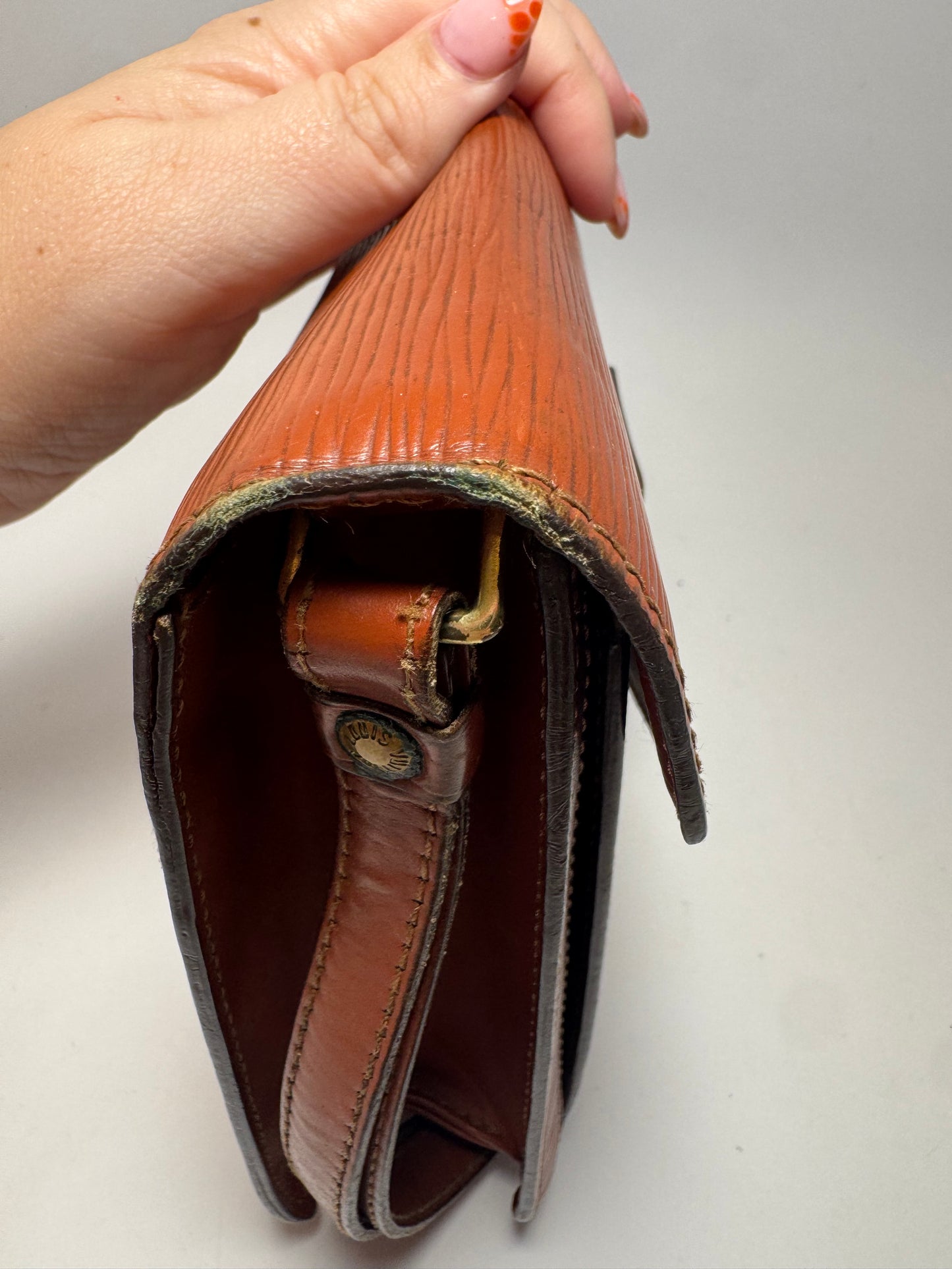 Louis Vuitton Epi Leather Serie Draggone Clutch - Fair condition