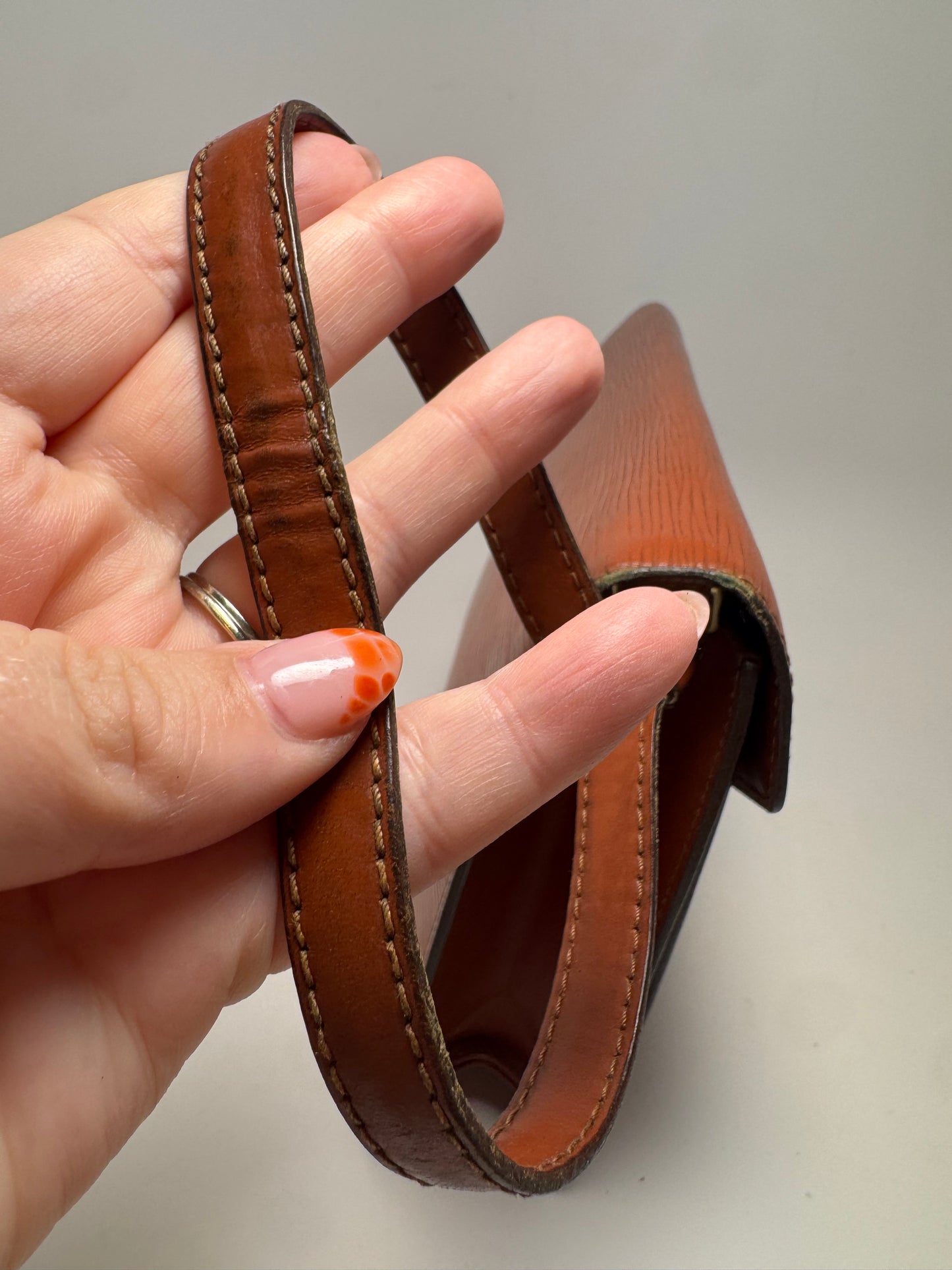 Louis Vuitton Epi Leather Serie Draggone Clutch - Fair condition