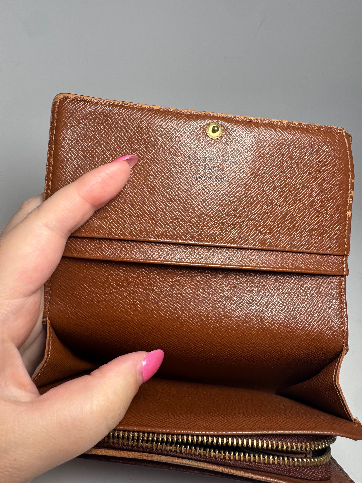 Louis Vuitton Porte Monnaie Tresor Monogram Compact Wallet